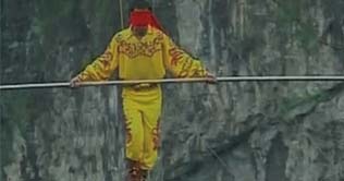 Chinese tightrope walker takes to the cliffs